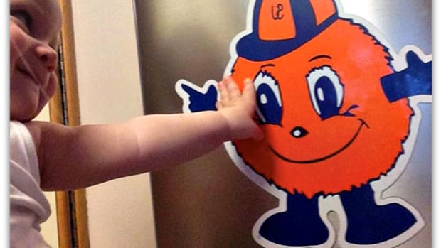  Baby P looks lovingly at our "Orange Man," Syracuse University's mascot.