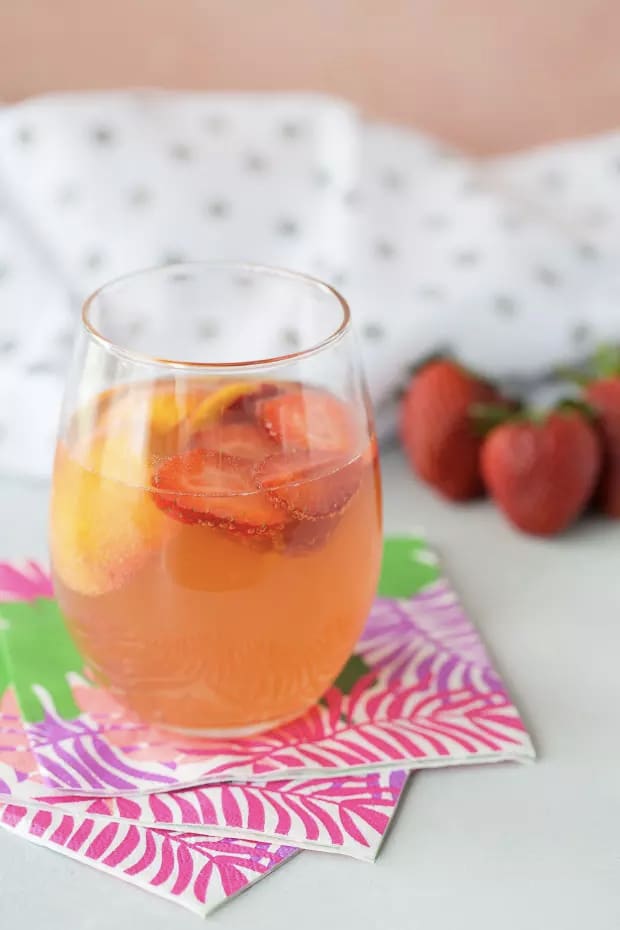 Sparkling Summer Sangria = Rosé + Peach schnapps + Fruit