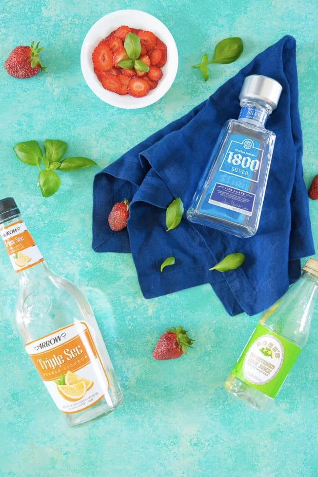 Strawberry-Basil Margarita = Tequila + triple sec + strawberries + basil