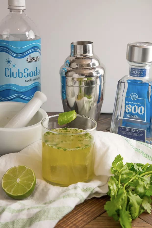 Cilantro-Lime Cooler = Tequila + Club soda + lime + cilantro + sugar