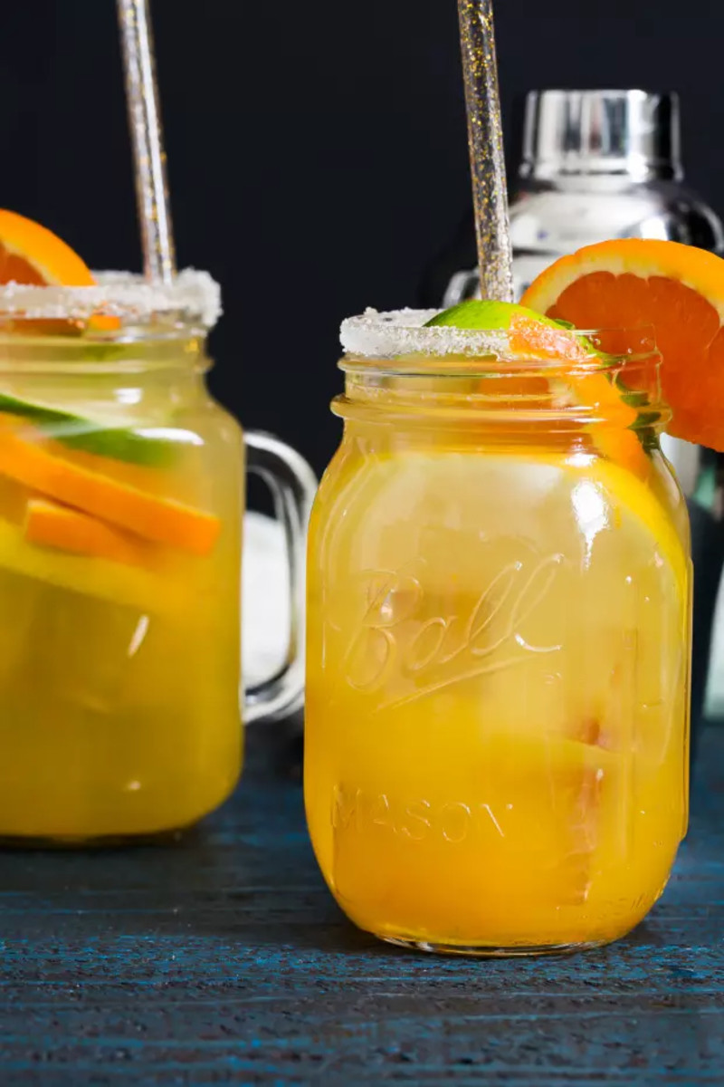 Ginger Citrus Cooler = Rum + Triple Sec + OJ + Lemonade + Lime juice + Simple syrup + Mint