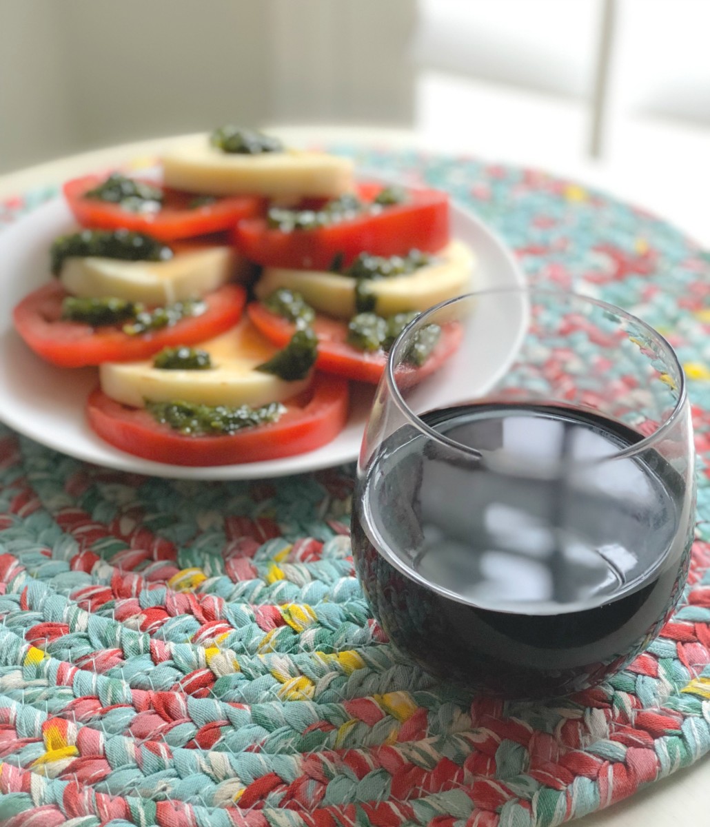 wine and caprese salad appetizer