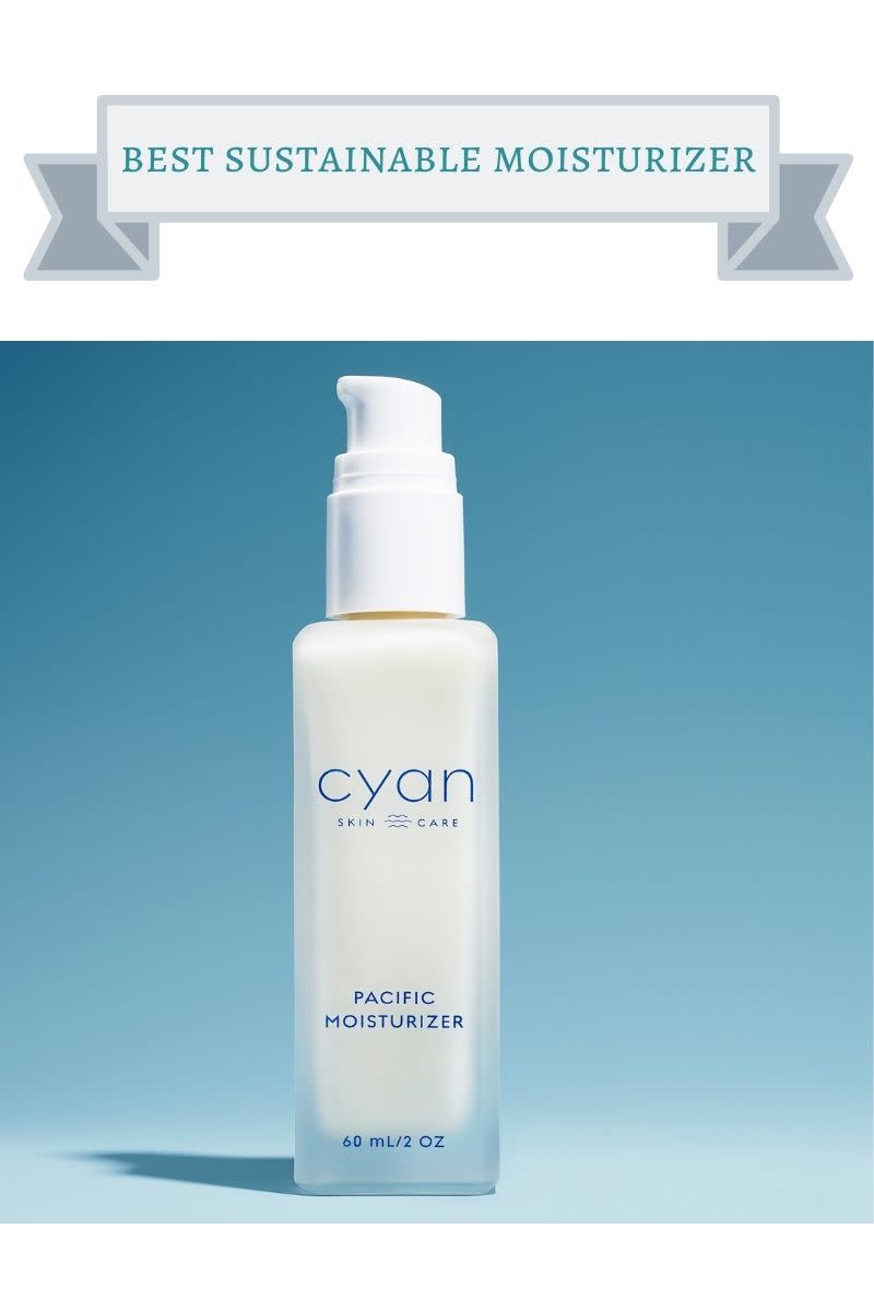 white bottle in front of blue background with dark blue writing on bottle that says cyan skin care pacific moisturizer