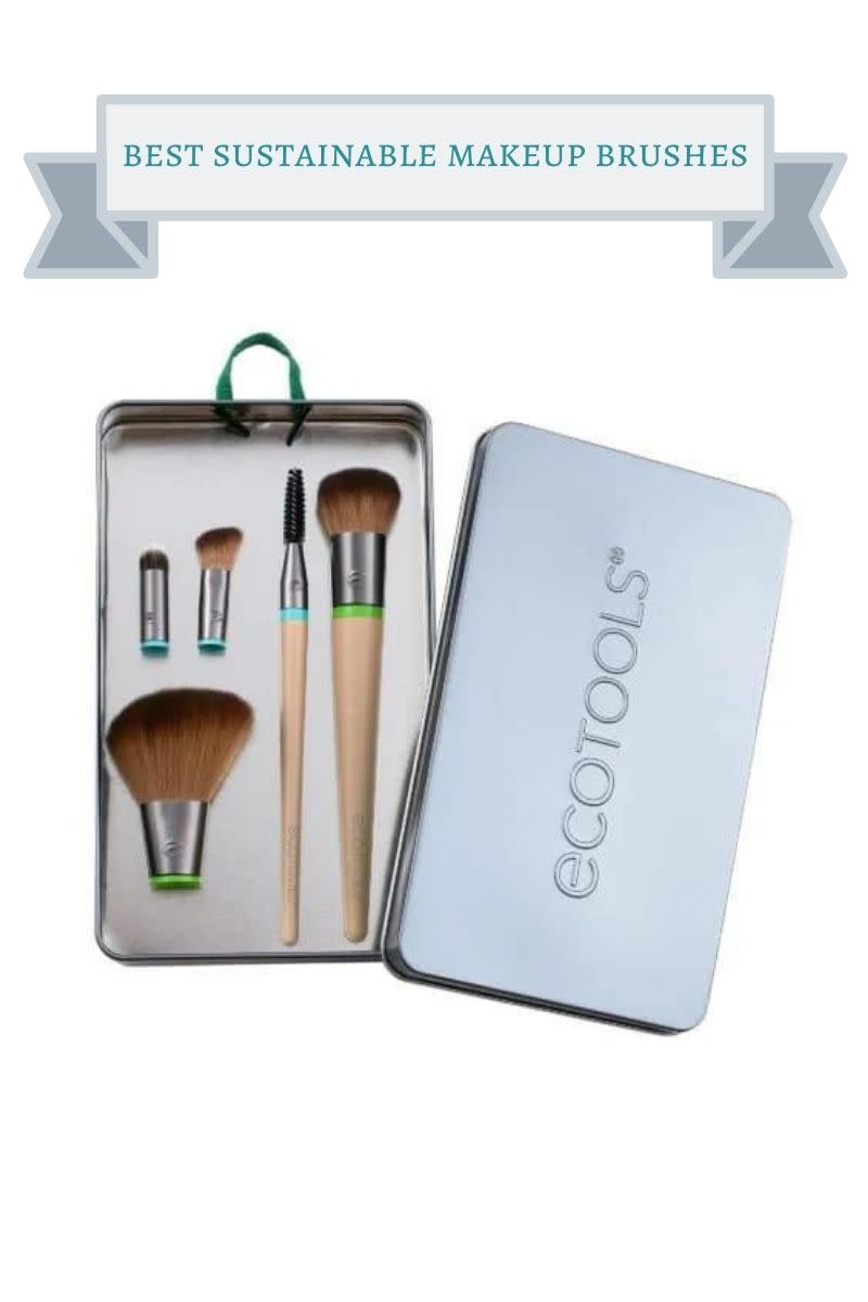 grey metal rectangular box with makeup brushes with brown handles and brown bristles