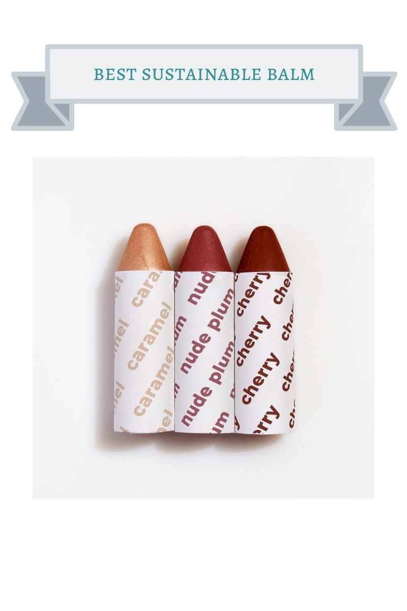 caramel, plum and cherry colored lip balms that look like crayons with white labels with writing the color of the balm