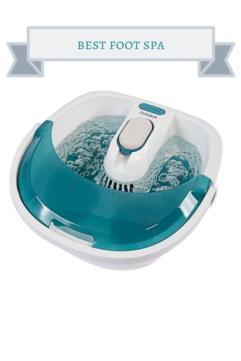 teal and white foot spa with bubbly water