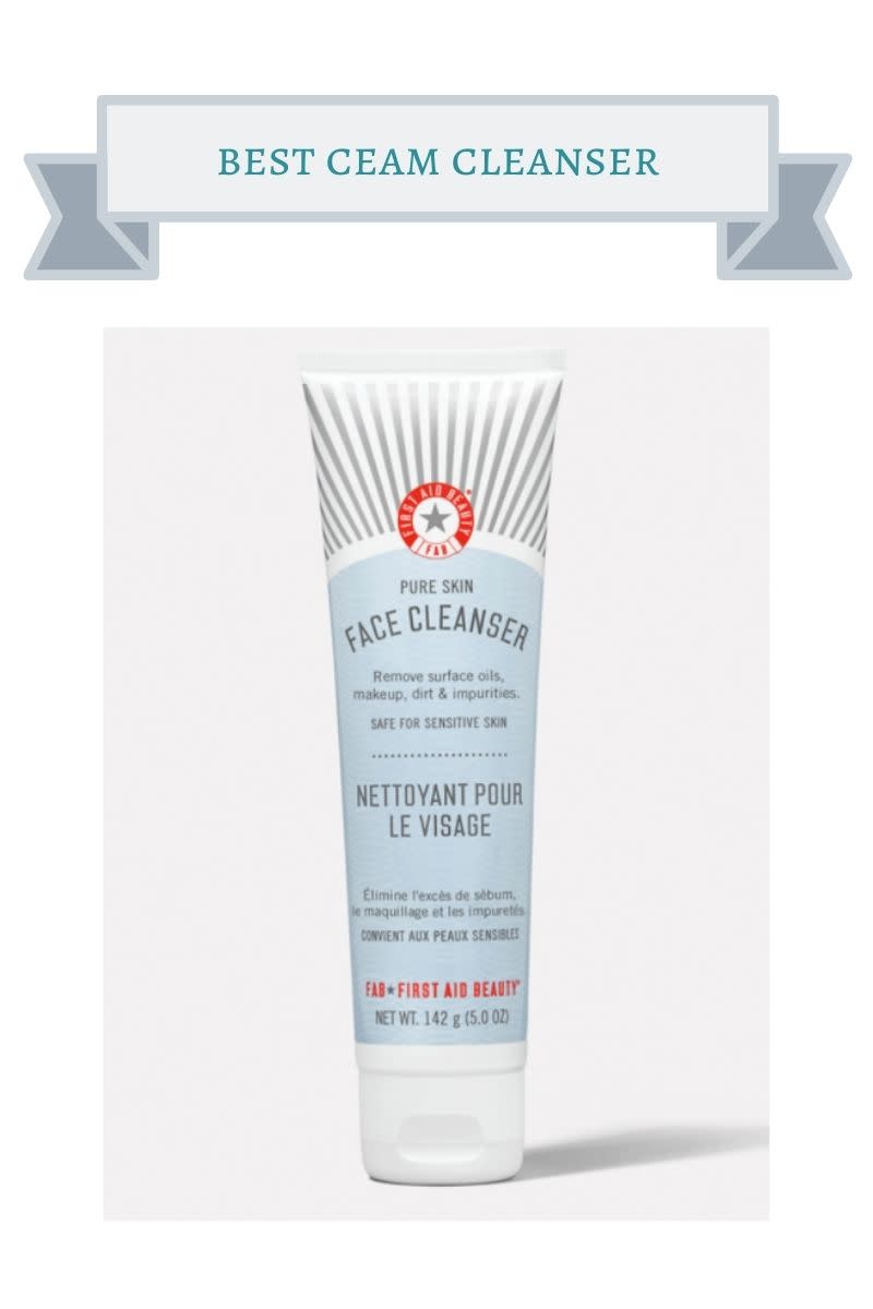 white, gray and blue bottle of first aid face cleanser with gray stripes, blue bottle and red first aid logo with gray star