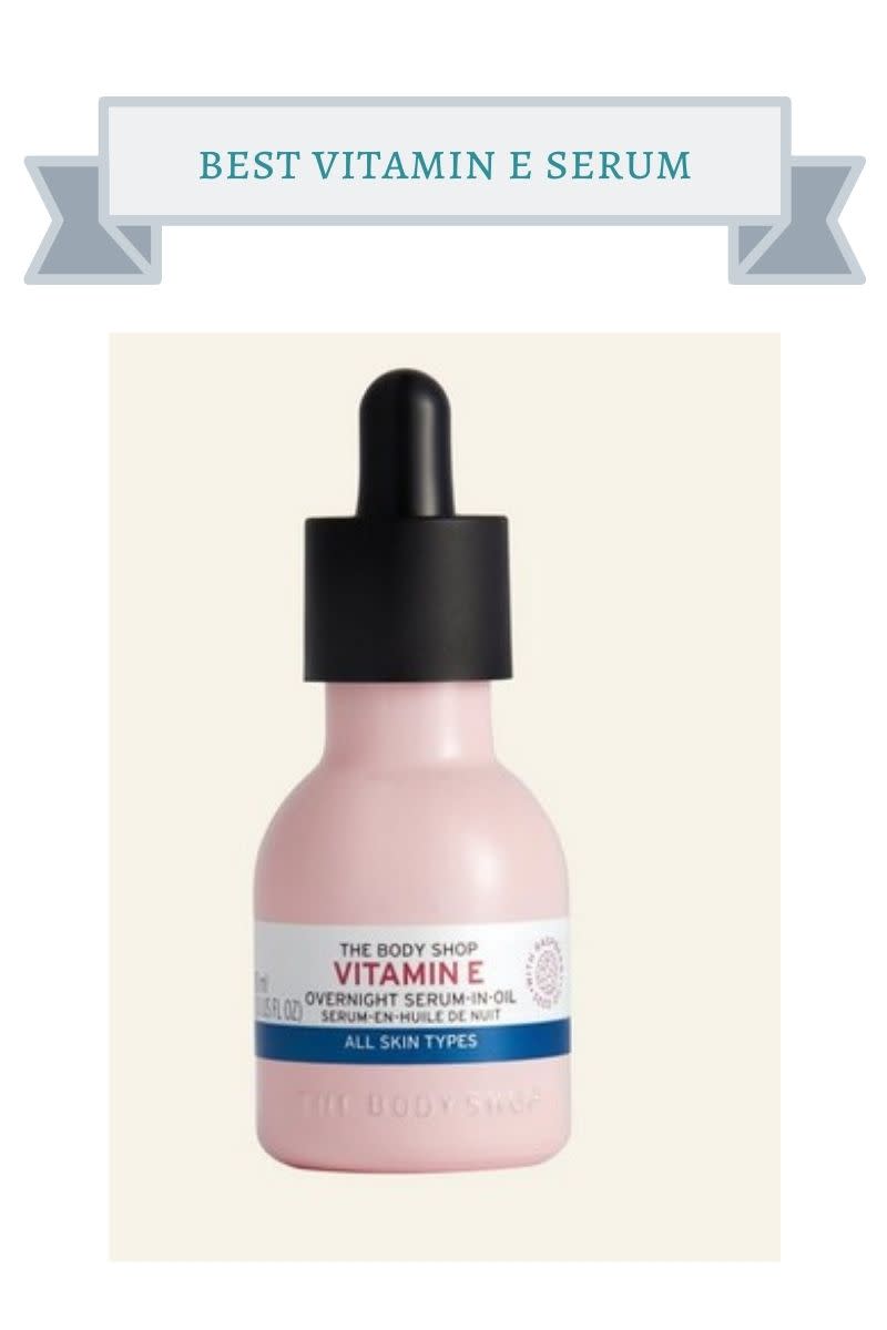 light pink bottle of the body shop vitamin e serum oil with black dropper lid