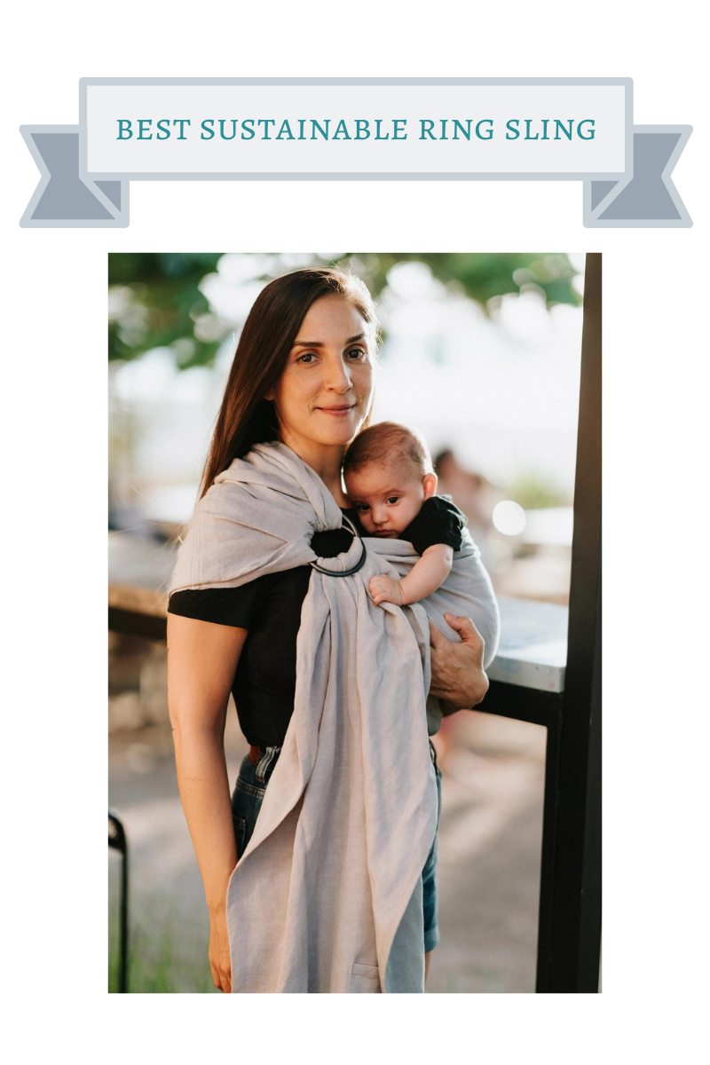 baby in beige ring sling on woman with straight brown hair