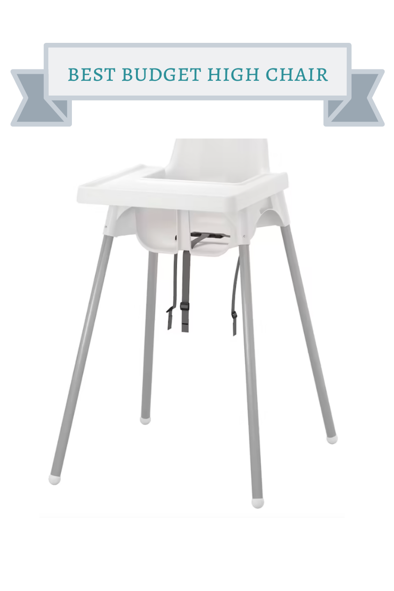 ikea high chair with white seat and tray and silver legs