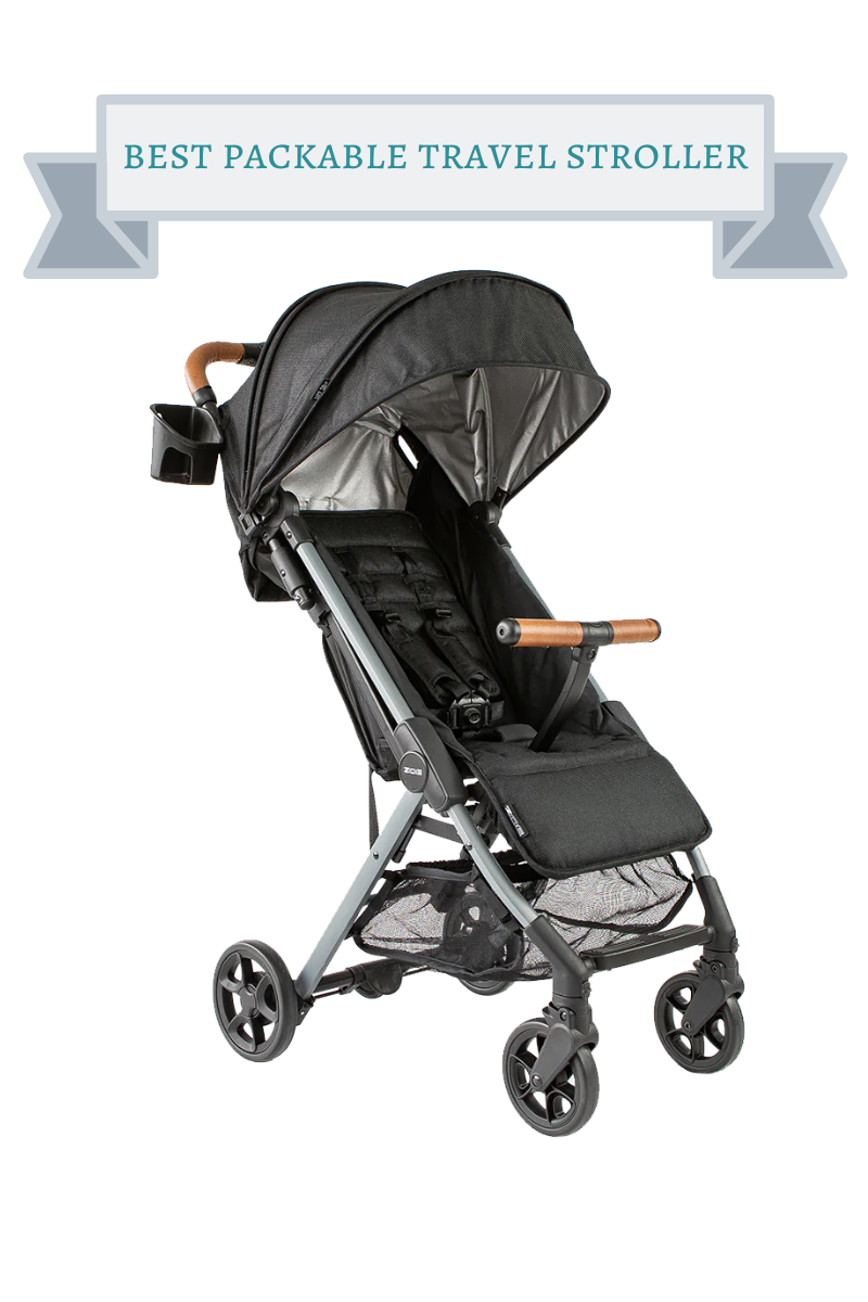 black travel stroller with brown leather handle