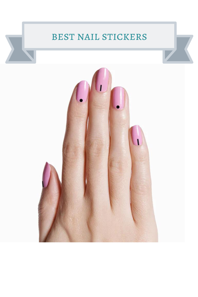 black geometric nail stickers on pink nails