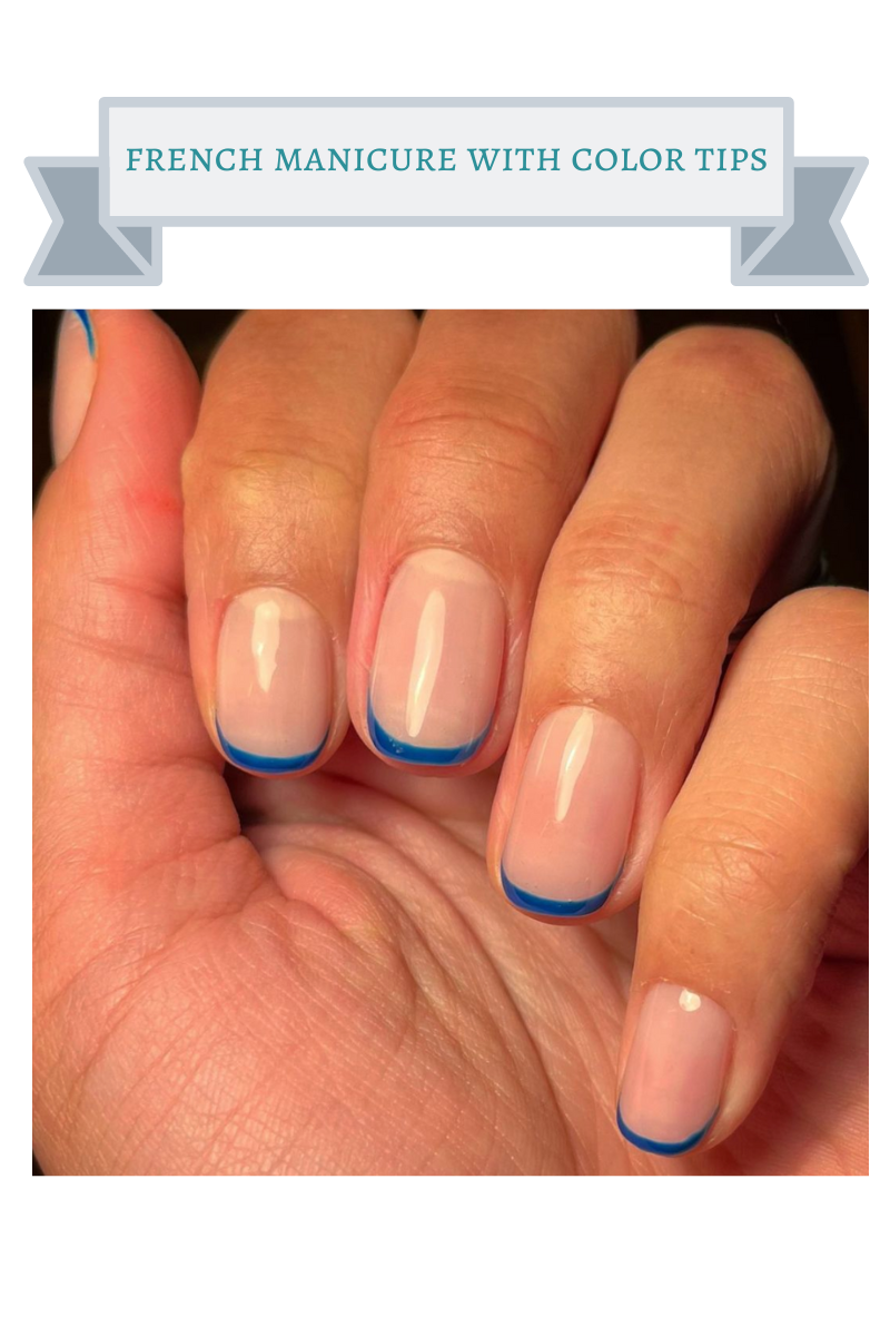 hand with french manicure with cobalt blue tips