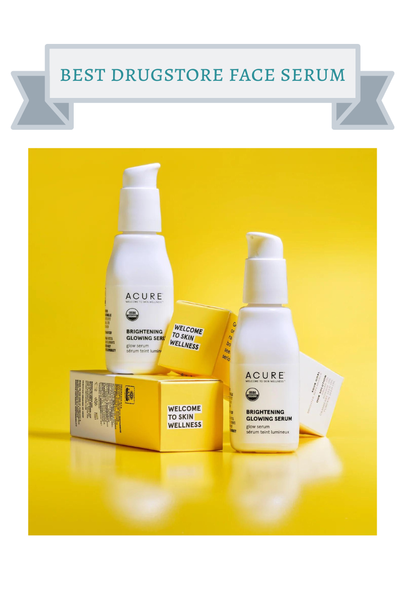 two white bottles of acure brightening glowing serum on white and yellow boxes