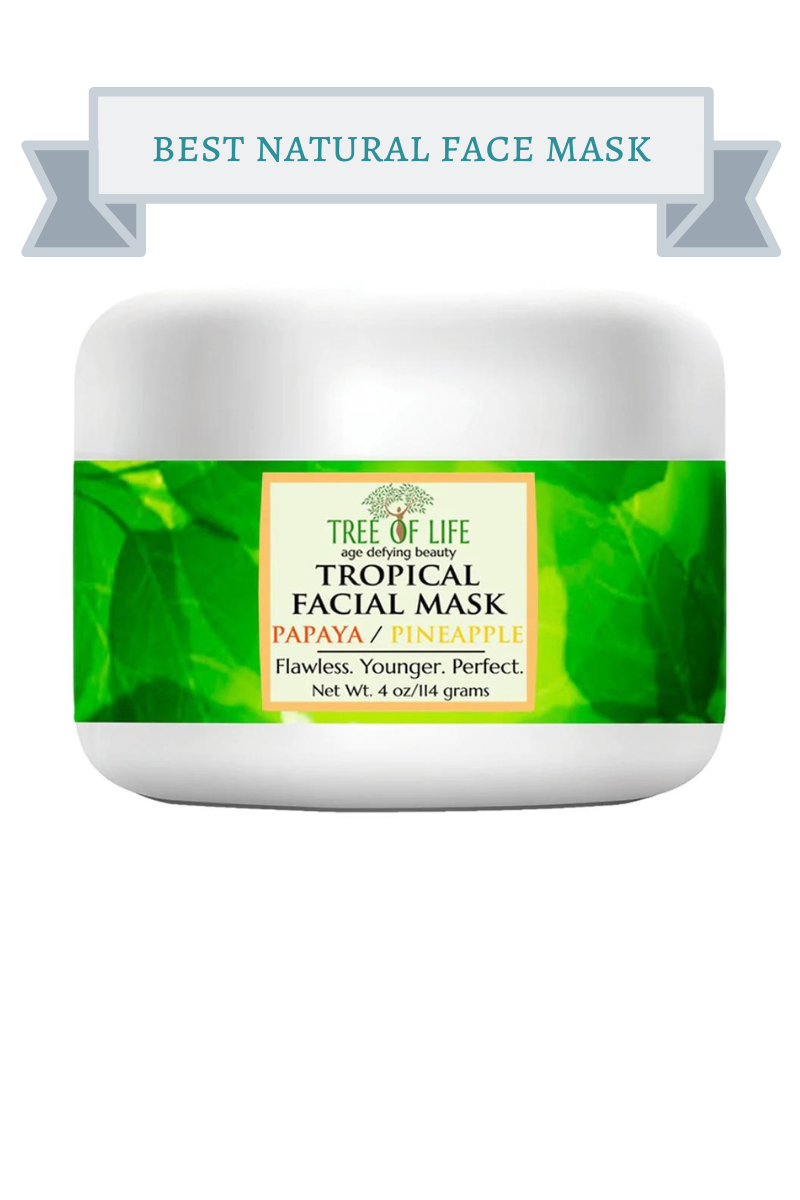 white jar with green leaves on label of tree of life tropical face mask